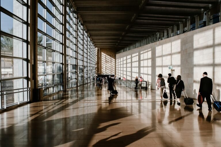 People walking through an airport